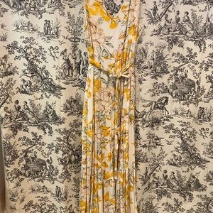 Nicole Miller yellow floral maxi dress with self belt and side zipper. Size 10